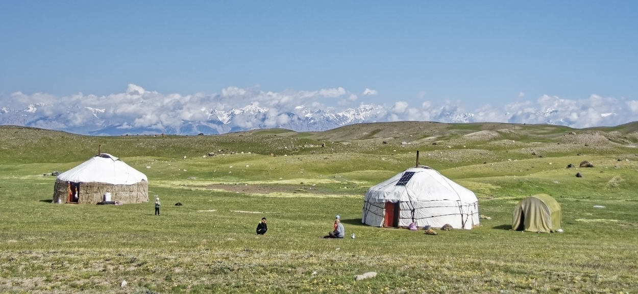 Yurts in a field in Kyrgyzstan