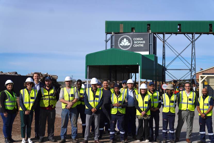 DDE Director Marcel Germann at the Coega Biomass Centre with the workers