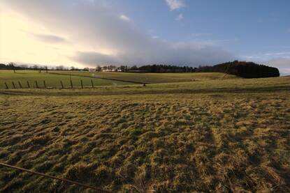 Farmers as stewards of biodiversity, playing a crucial role in enhancing and preserving the natural environment.