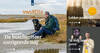 VWS'er Adriaan Brouwer met zijn zwarte hond op het strand van Terschelling
